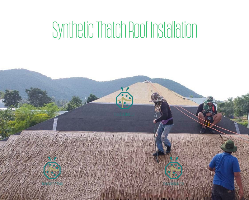 Synthetic thatch roof installation for beach inn cottage